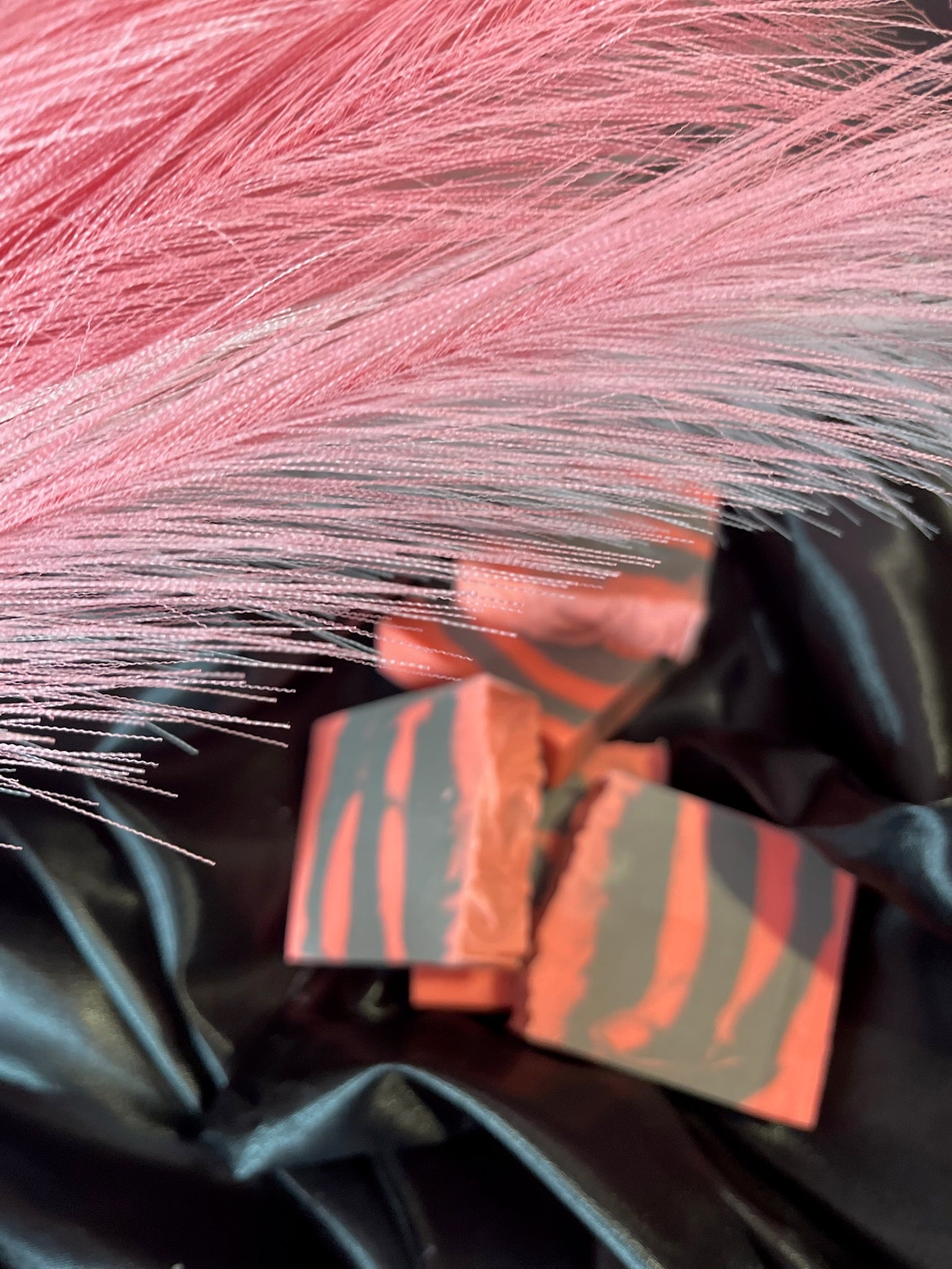 Gray and coral striped soap bars with swirled texture detail